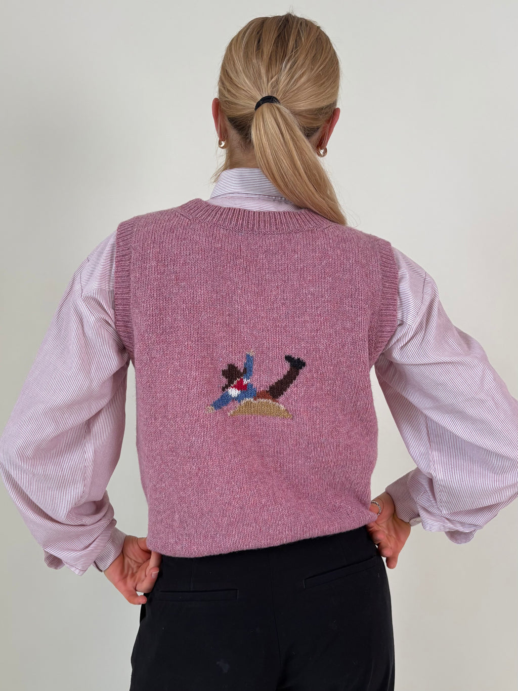 Horse and cowboy vest