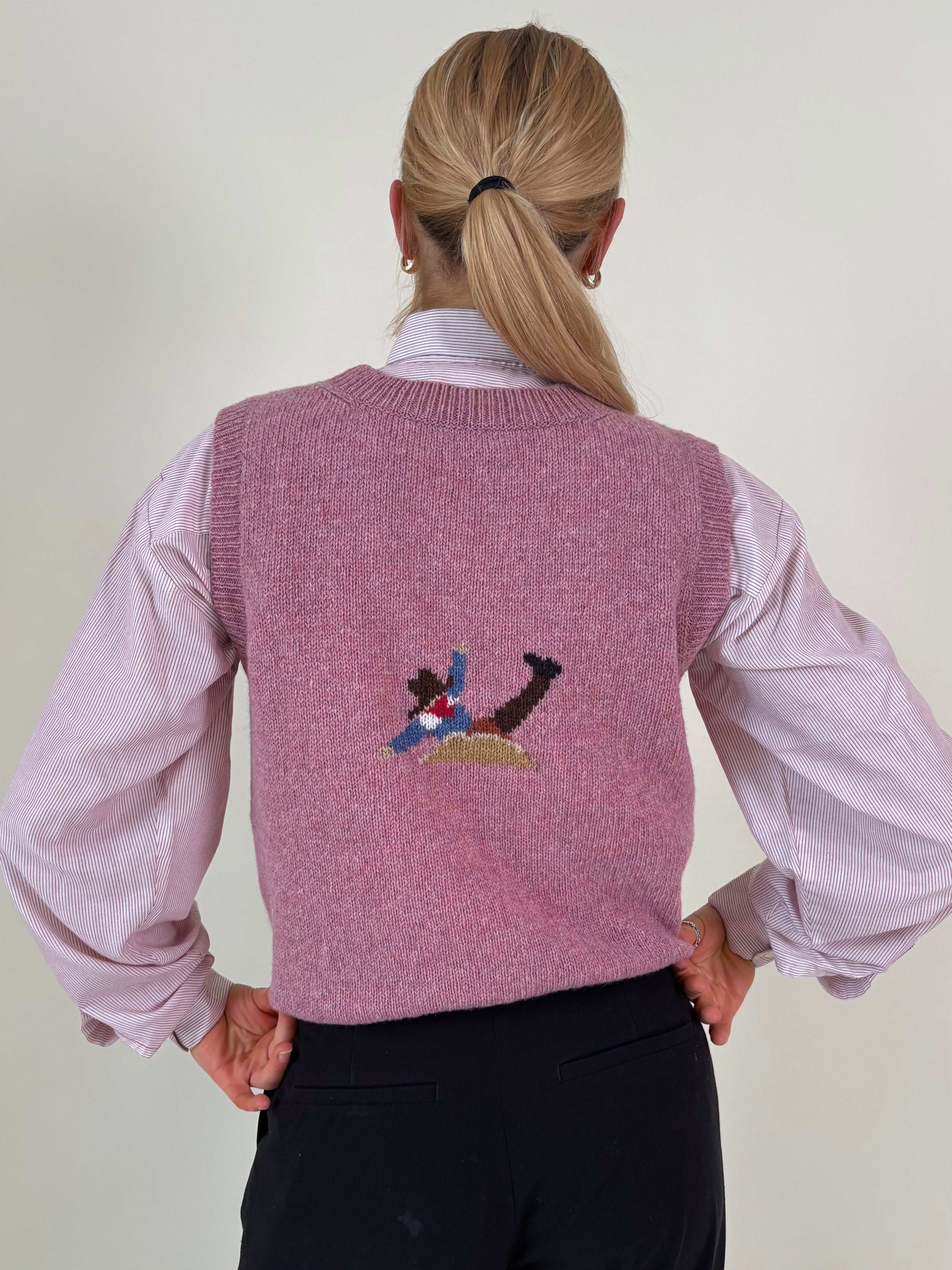 Horse and cowboy vest